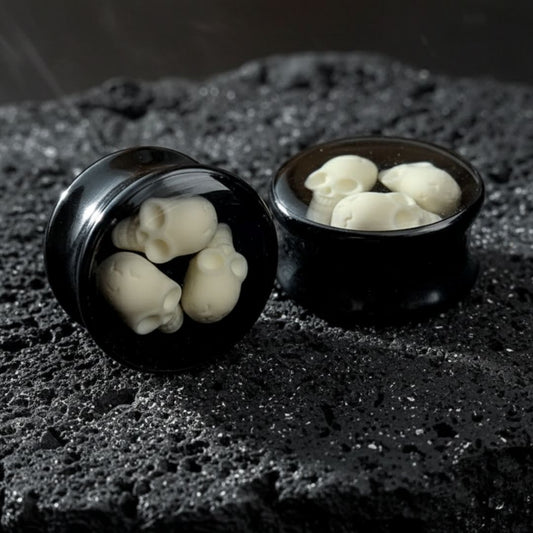 Lightweight acrylic grim reaper plugs with black background for stretched ear lobes. Goth alternative gauges, 10mm to 24mm.
