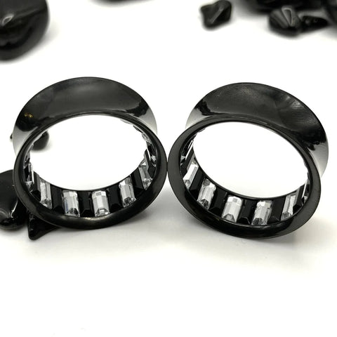 Black Steel Tunnels with silver gem inlay shimmering from the inside.