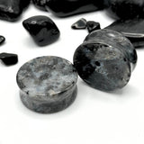 Black Labradorite Stone Plugs with iridescent sheen and polished finish