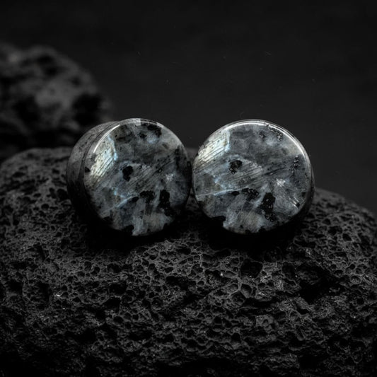 Pair of black labradorite stone plugs (gauges) for stretched ear lobes. Unique dark jewelry with subtle shimmer, 6mm to 25mm.