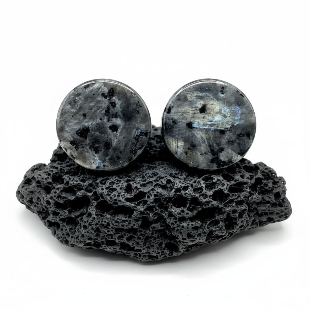 Pair of black labradorite stone plugs (gauges) for stretched ear lobes. Unique dark jewelry with subtle shimmer, 6mm to 25mm.