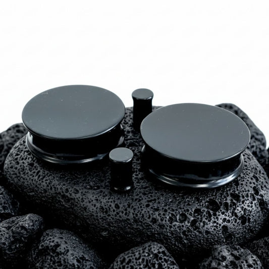 Solid black silicone flexible tunnels and soft ear gauges, perfect for sleeping or heavy duty wear. Sizes 4mm to 51mm.