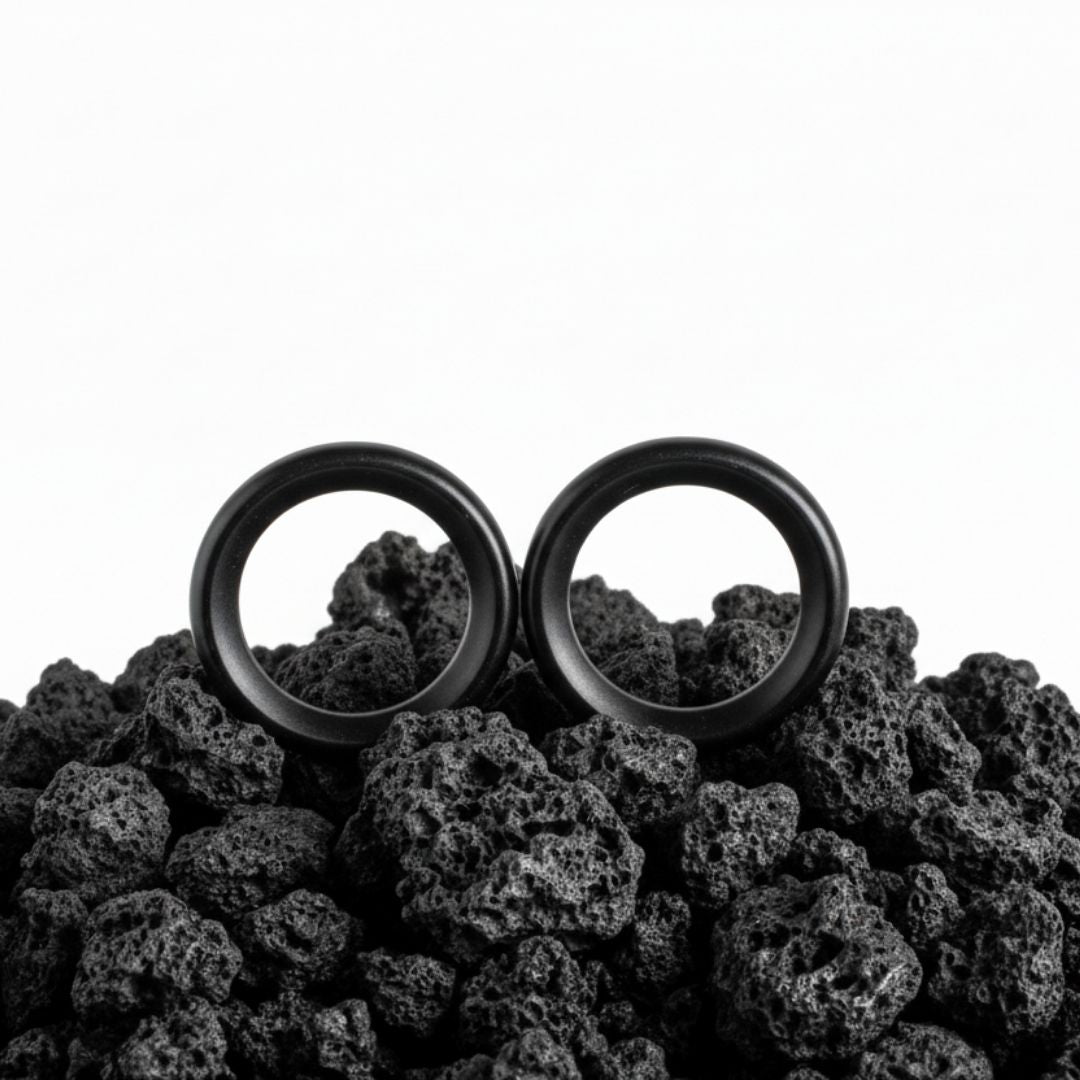 Pair of black flexible silicone tunnels (plugs/gauges) for stretched ear lobes, 4mm to 25mm