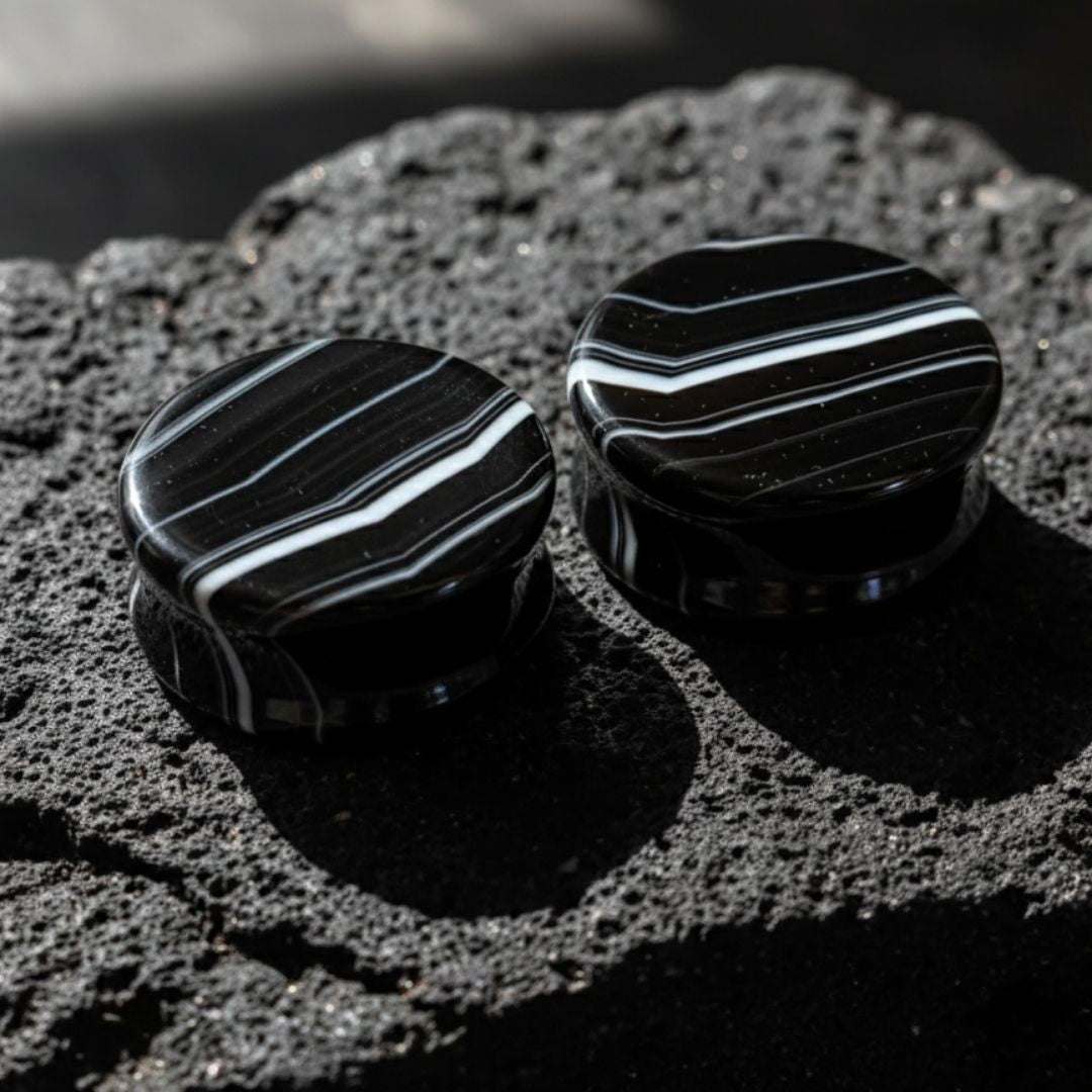 Pair of deep black striped agate stone plugs, natural double flare gauges for stretched ear piercing culture, USA stock.