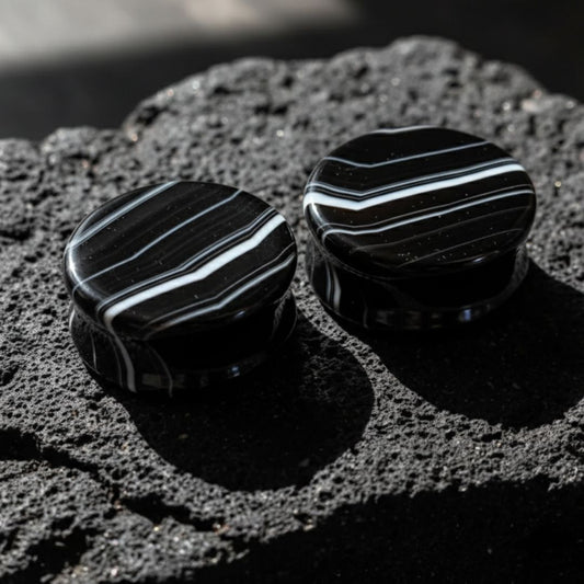 Pair of deep black striped agate stone plugs, natural double flare gauges for stretched ear piercing culture, USA stock.