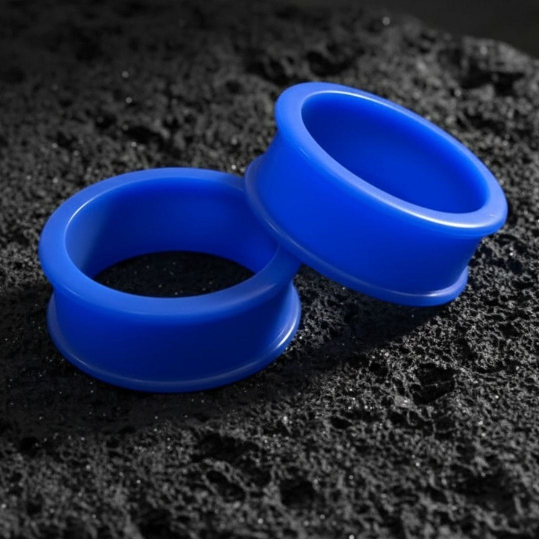 Pair of deep blue silicone tunnels for stretched ears. Ultra-flexible large gauge plugs ranging from 6g up to 51mm.
