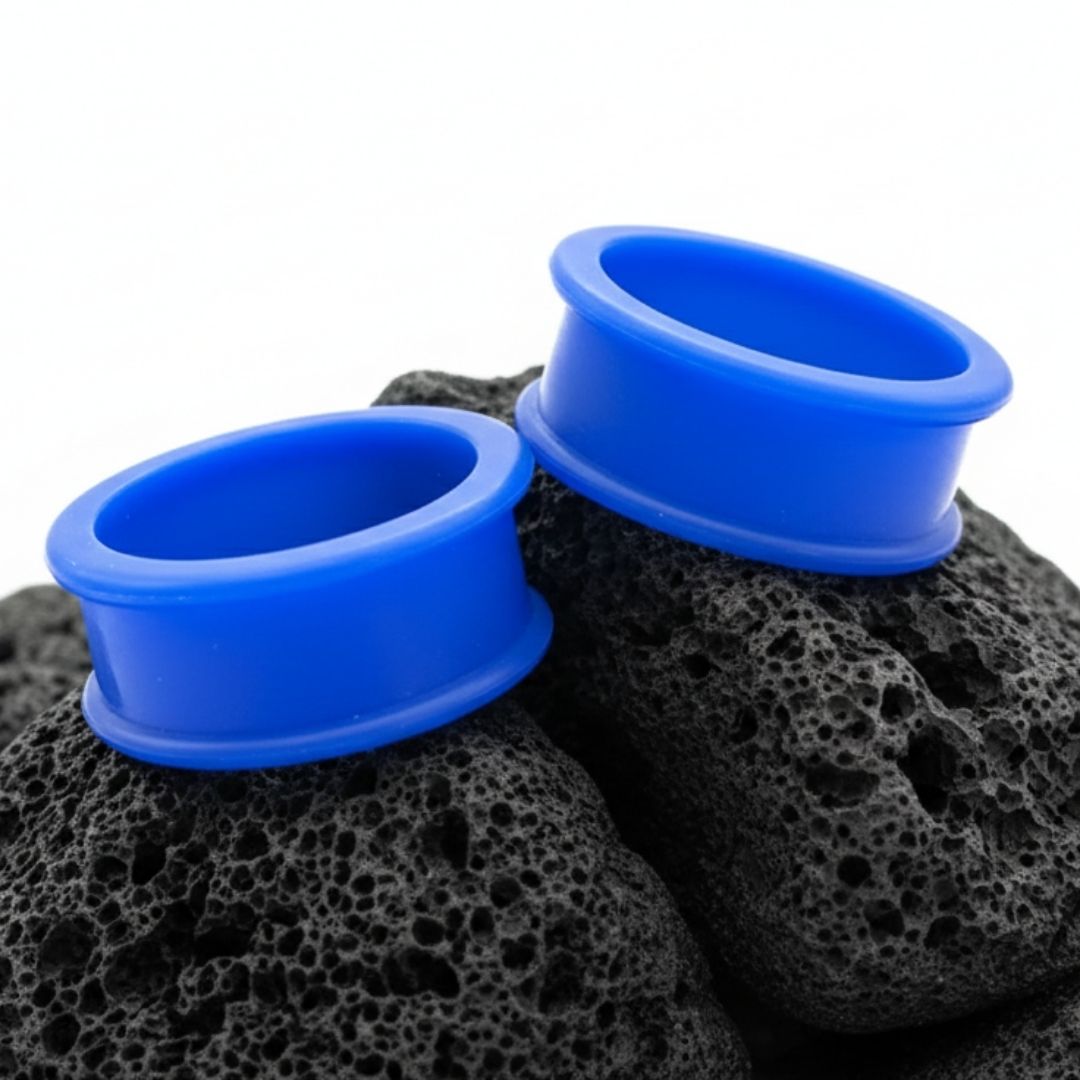 Pair of deep blue silicone tunnels for stretched ears. Ultra-flexible large gauge plugs ranging from 6g up to 51mm.