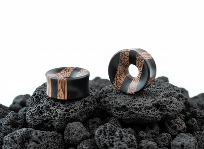Pair of Coconut and Areng wood tunnels (6mm-25mm) for stretched earlobes. Dark organic wood gauges with light inlay.