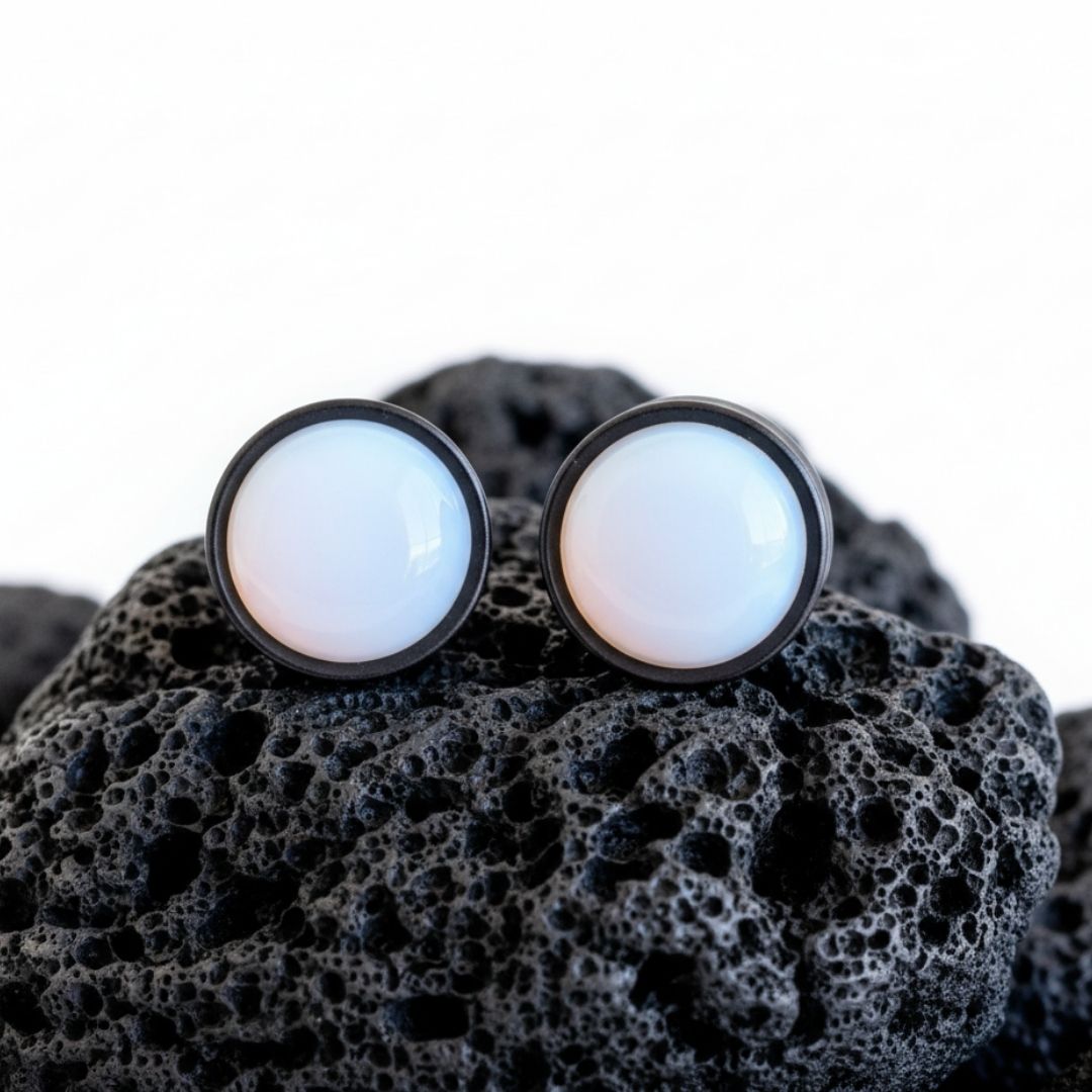 Pair of deep black Ebony Wood plugs with round, iridescent Opalite stone centers. Organic gauges for stretched ears 6mm to 25mm.