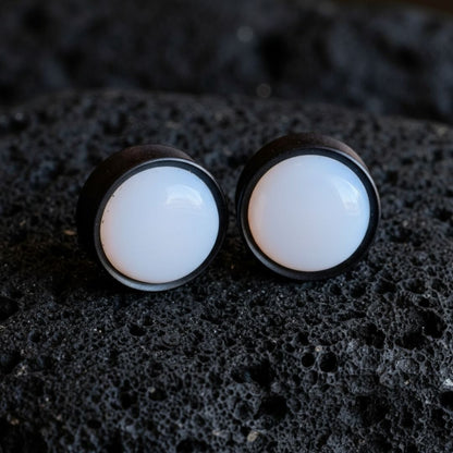 Pair of deep black Ebony Wood plugs with round, iridescent Opalite stone centers. Organic gauges for stretched ears 6mm to 25mm.