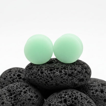 Glow In The Dark Moonstone Plugs for stretched ears, available in sizes 2G (6mm) up to 1 inch (25mm). Unique alt jewelry.