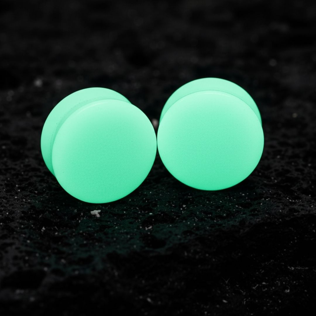 Glow In The Dark Moonstone Plugs for stretched ears, available in sizes 2G (6mm) up to 1 inch (25mm). Unique alt jewelry.