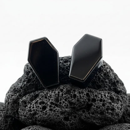 Pair of polished Black Obsidian Coffin Plugs for stretched ears. Dark, heavy stone gauges with an edgy shape, perfect for goth alt jewelry collectors.
