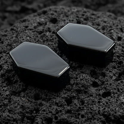 Pair of polished Black Obsidian Coffin Plugs for stretched ears. Dark, heavy stone gauges with an edgy shape, perfect for goth alt jewelry collectors.