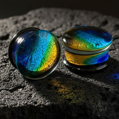 Pair of deep blue oceanic glass plugs and gauges for stretched ears, available in sizes 6mm to 19mm. Alt jewelry shipped from USA.