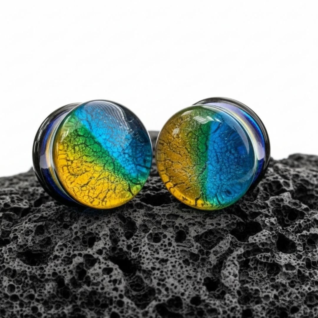 Pair of deep blue oceanic glass plugs and gauges for stretched ears, available in sizes 6mm to 19mm. Alt jewelry shipped from USA.