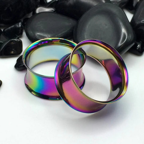 Vibrant rainbow-colored steel tunnels with a double flare finish.