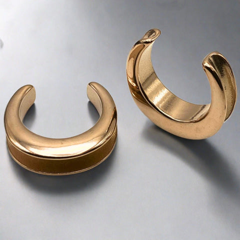Brass Crescent saddle spreaders for stretched ears