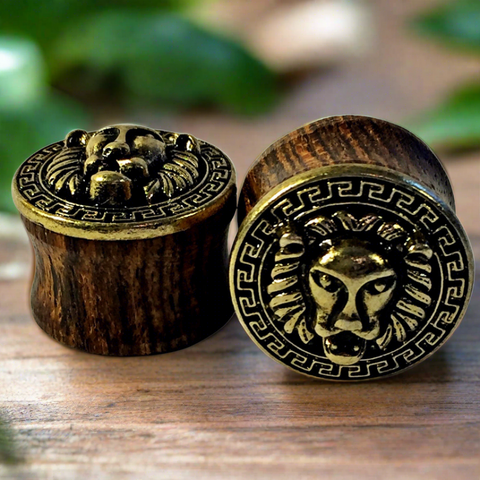 Plugs for stretched ears with a brass lion face