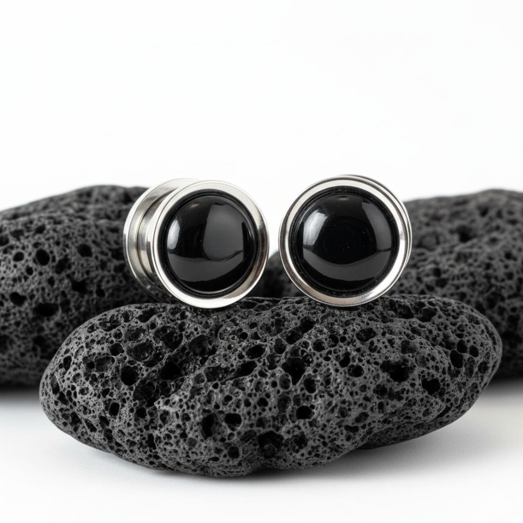 Pair of black onyx stone inlay plugs set into steel gauges (6mm - 16mm) for stretched ear piercings, alternative jewelry.