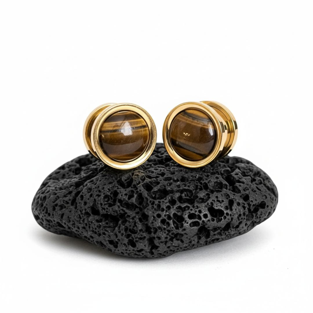Pair of golden steel plugs with natural brown and gold Tigers Eye stone inlay. Stretched ear jewelry 6mm to 16mm.