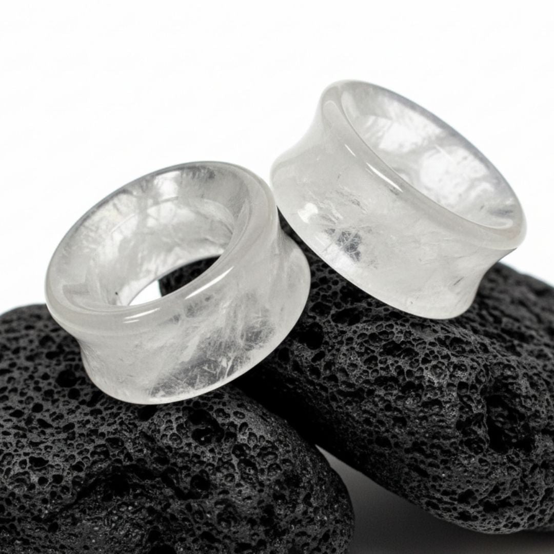Icicle Quartz Tunnels for stretched ears on dark volcanic stone