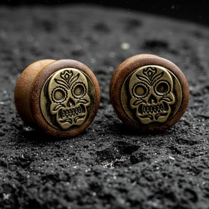 Pair of organic wood plugs carved with intricate Sugar Skull / Dia de Muertos design. Dark brown wood gauges 8mm-16mm.