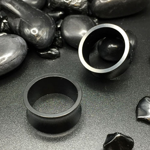 Thick Polished Black Steel Tunnels with a sleek finish