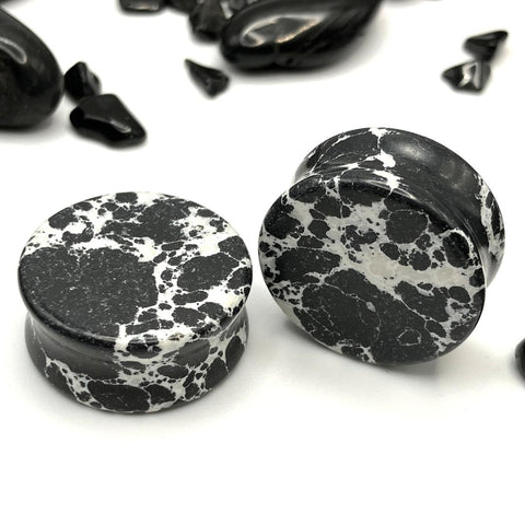 Black Imperial Turquoise Plugs showcasing unique stone patterns