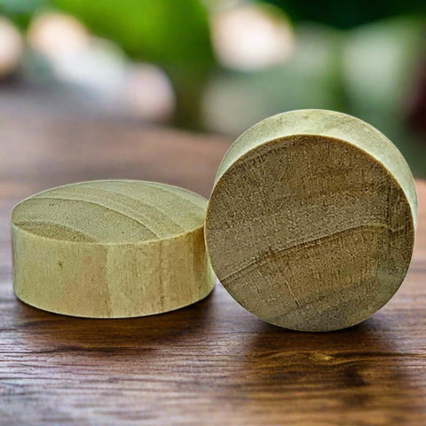 a pair of crocodile wood plugs for stretched ears